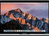 une image représentant un ordinateur portable avec une montagne en arrière-plan