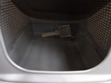 an image of a basket that is inside of a washing machine
