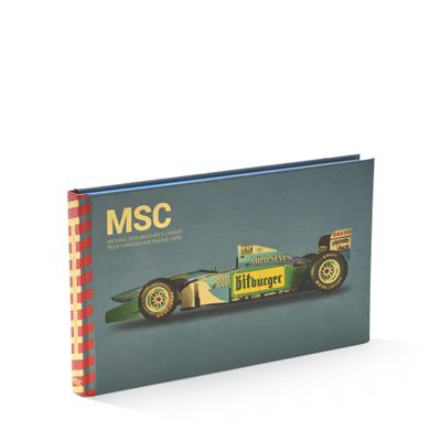 a book with a picture of a racing car on it