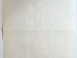 an image of a piece of paper on a table next to a cup of coffee