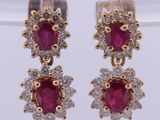 pair of ruby and diamond earrings