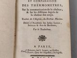 an open book with a black and white title on it