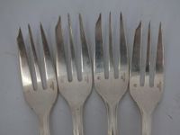 Lot en métal argenté comprenant des couteaux à beurre, des c… (photo 3)