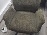 a chair that is sitting in the corner of a room