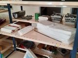 a shelf with many items on it in the kitchen