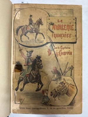 un vieux livre sur lequel figure le dessin d'un homme à cheval