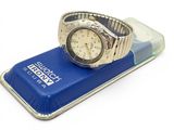 a watch sitting on top of a case on a white surface