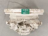 an old white corb with a green label on it