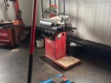 a picture of a floor jack in a garage