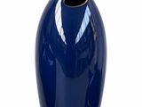 a blue vase with a gold rim on a white background