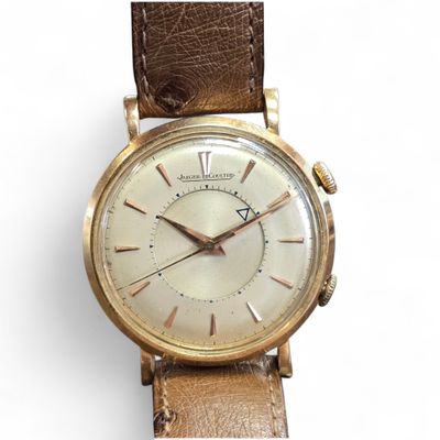 an image of a close up of a wrist watch on a white background