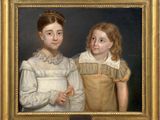 portrait of two young girls, one in a yellow dress and the other in a white dress