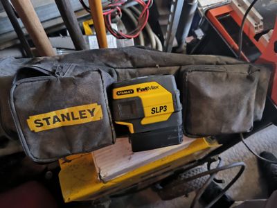 a picture of a tool bag that is sitting on top of a table