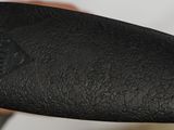 a close up of a person holding a knife in their hand