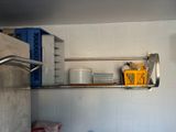 a small kitchen with a sink and a stove