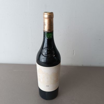 a bottle of wine that is sitting on a table
