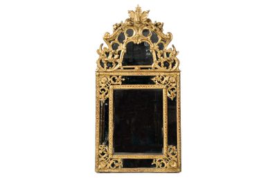 a gold frame with a mirror on it on a white background