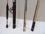 several different types of fishing rods are lined up on a table