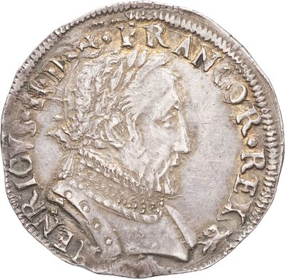 une pièce d'argent représentant une femme