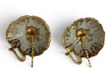 pair of antique gold and white glass wall sconces