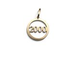 a close up of a gold pendant with the number 2000 on it