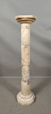 an image of a white marble pedestal with a marble top