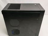 an image of a black computer case sitting on top of a white table