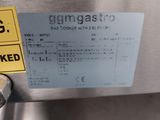 a picture of a stainless steel dishwasher with a checkered label