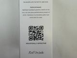 the back of a white box with a qr code on it