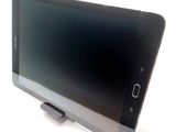 a tablet computer sitting on top of a table