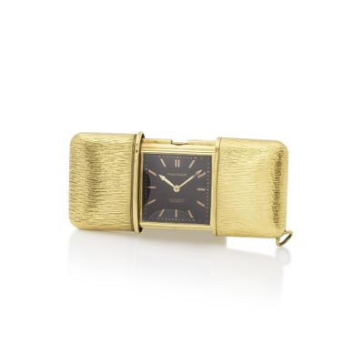 an image of a close up of a watch on a white surface