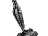 un aspirateur noir et bleu sur fond blanc
