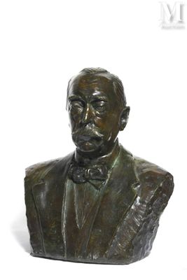 statue of a bust of a man wearing a suit and bow tie