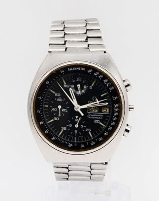 a close up of a watch on a white surface with a white background