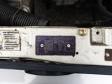 a close up of a car ' s engine showing the wiring