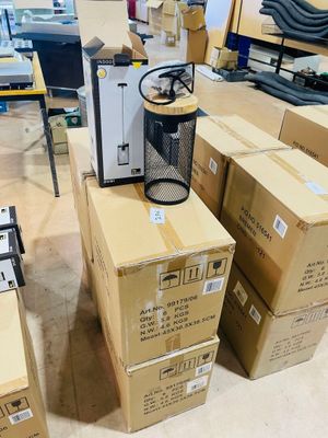 many boxes stacked on top of each other on the floor