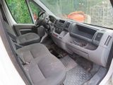 a picture of a car that is sitting in the back of the van