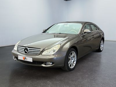 mercedes s - class in a showroom with a black floor and white walls