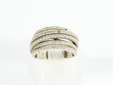 a close up of a diamond ring on a white surface