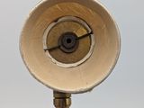 an image of a close up of a metal object on a pole