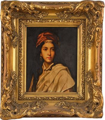 un tableau représentant une femme portant un turban, dans un cadre doré