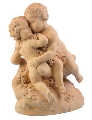 D'ASTÉ "chérubins aux grappes de raisins" terre cuite, signé…