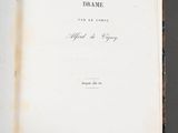 a book open on a table with a picture of a man on it