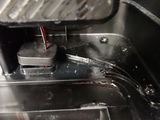 a close up view of a toaster with a frying pan in it