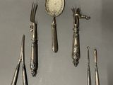 five different types of silverware on the table