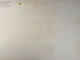someone is writing on a whiteboard in a room with a window