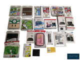 beaucoup de jeux et d'accessoires Nintendo Wii posés sur la table
