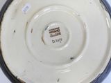 a close up of a bowl with a label on it