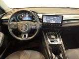 a picture of a car dashboard with a steering wheel and dashboard controls