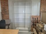 a picture of a room with a shower and a desk